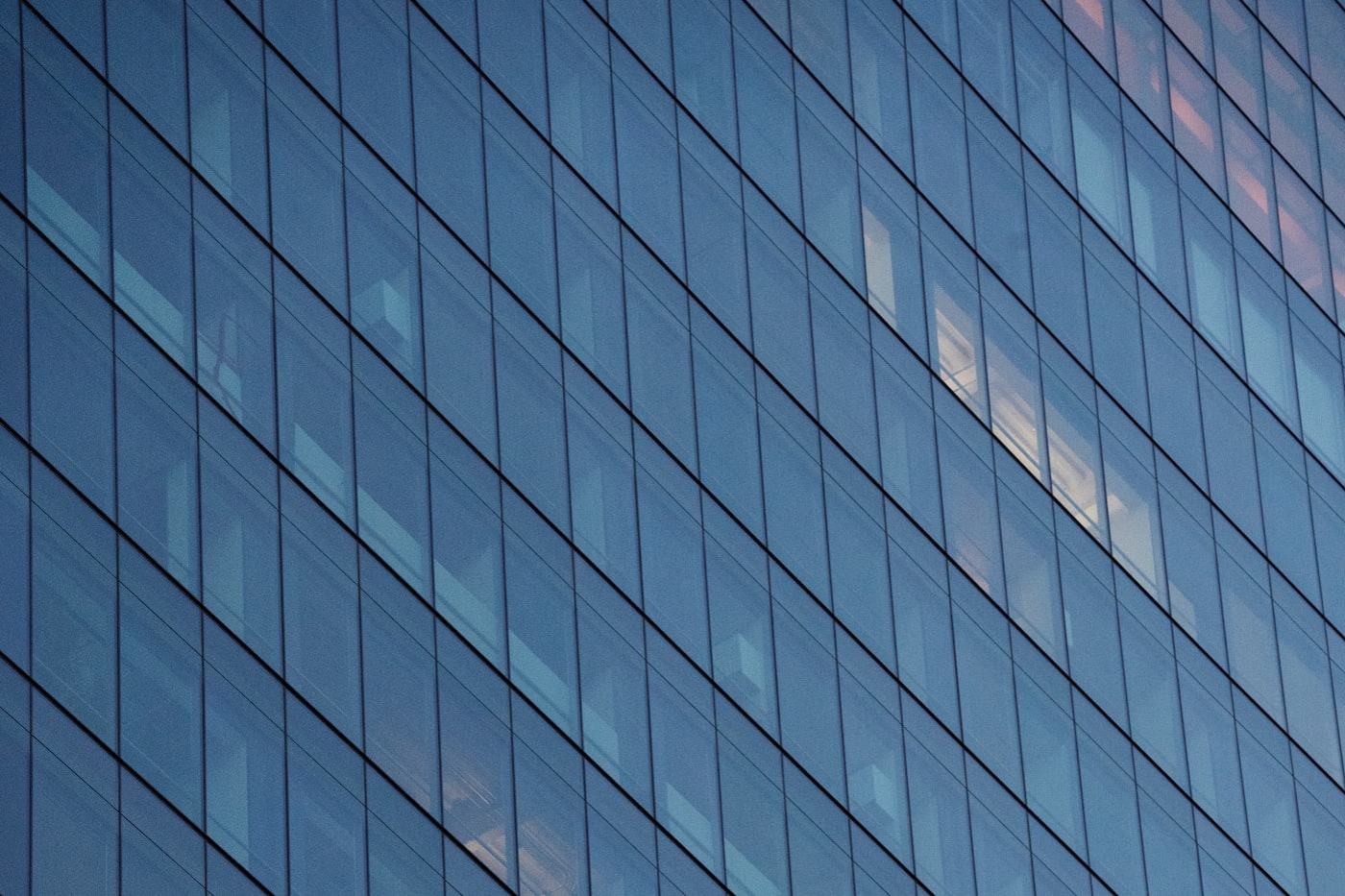 Glass facade of a modern commercial office building
