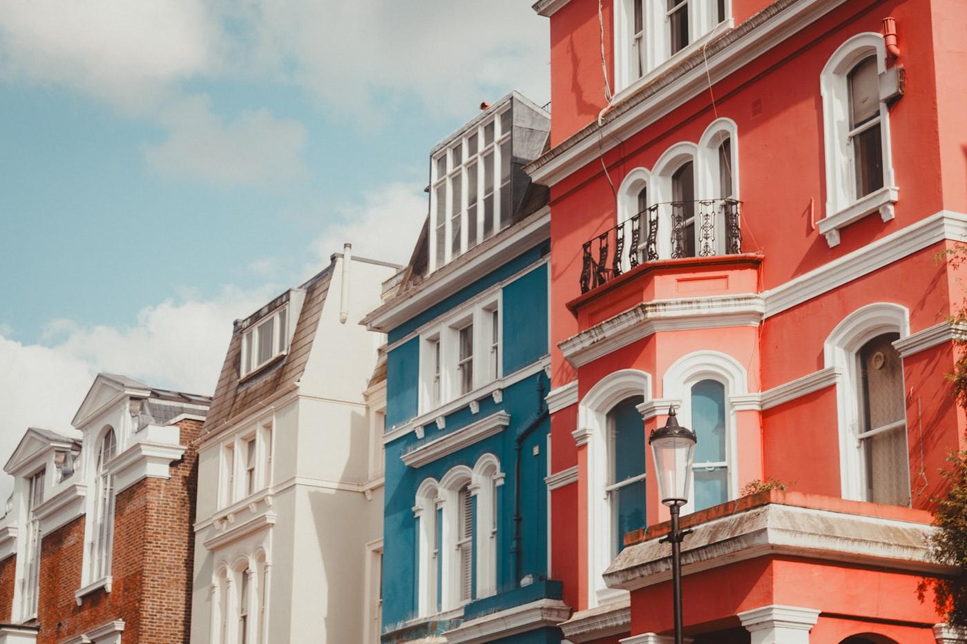 Painted Victorian terraced houses on a Notting Hill street